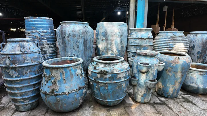 Antique blue glazed pots with a weathered finish